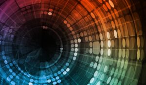 Abstract digital background with circular patterns, glowing dots, and curved lines in shades of red, orange, yellow, green, blue, and black. Intelligent signals appear to flow throughout the composition, creating a dynamic sense of motion and depth.